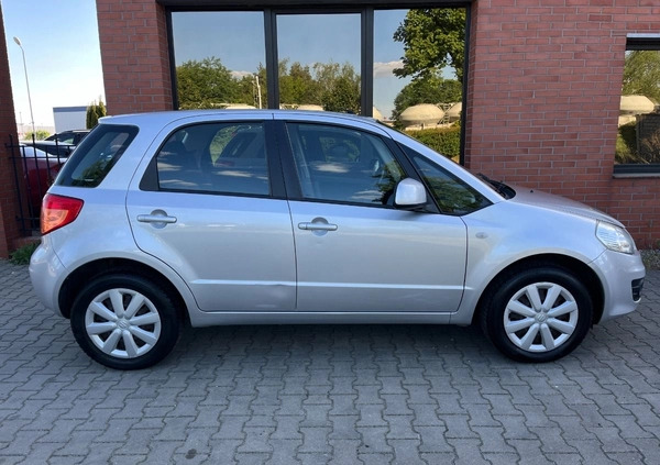 Suzuki SX4 cena 26900 przebieg: 153000, rok produkcji 2012 z Borne Sulinowo małe 254